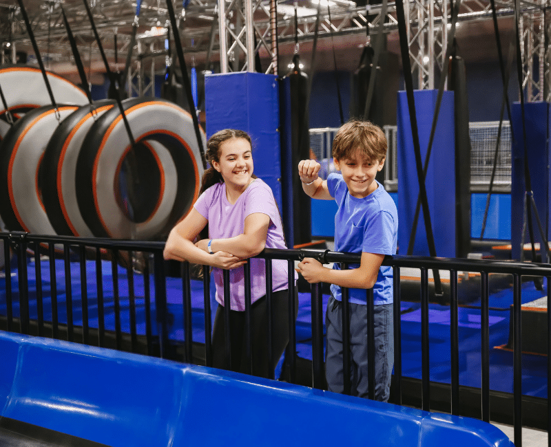 Two kids having fun at Sky Zone with BOGO ticket deals